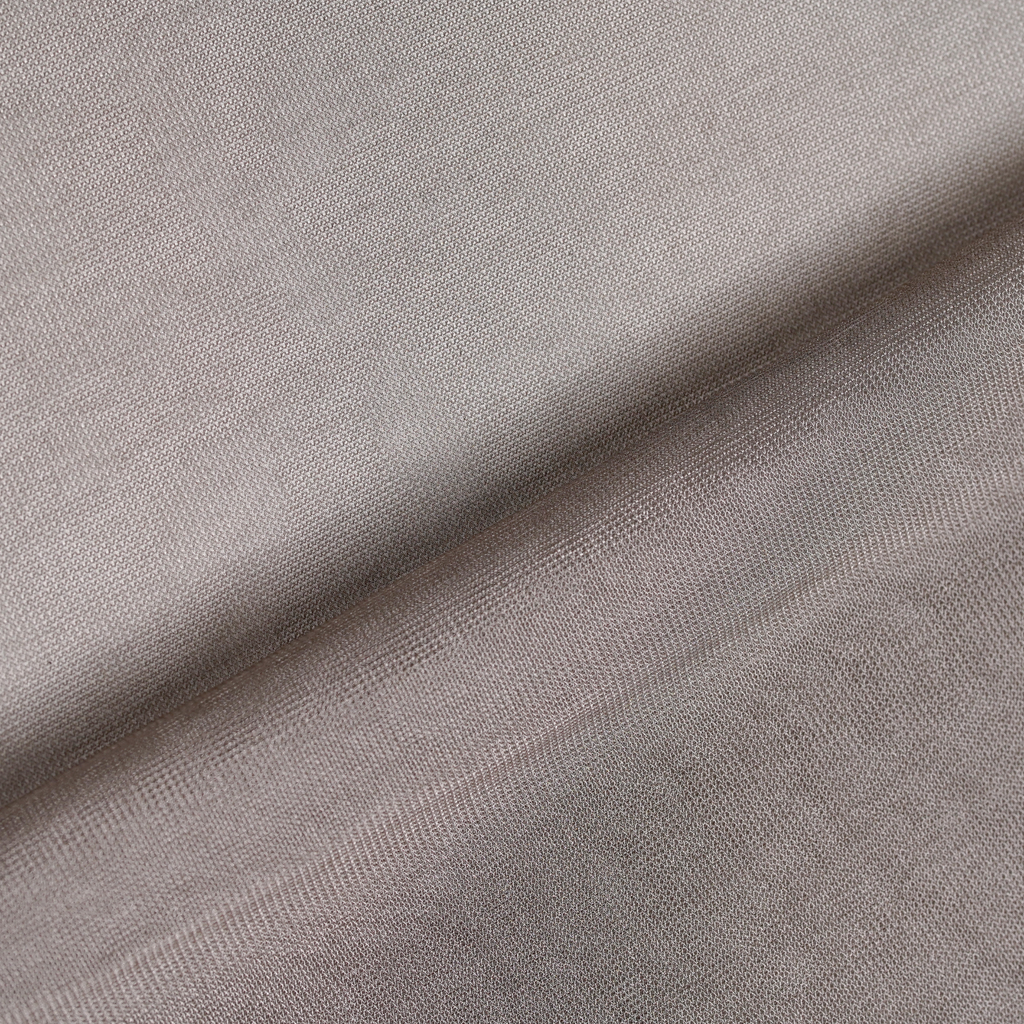 WOREMOR® SilverWeave silver conductive mesh shielding fabric shown flat on surface