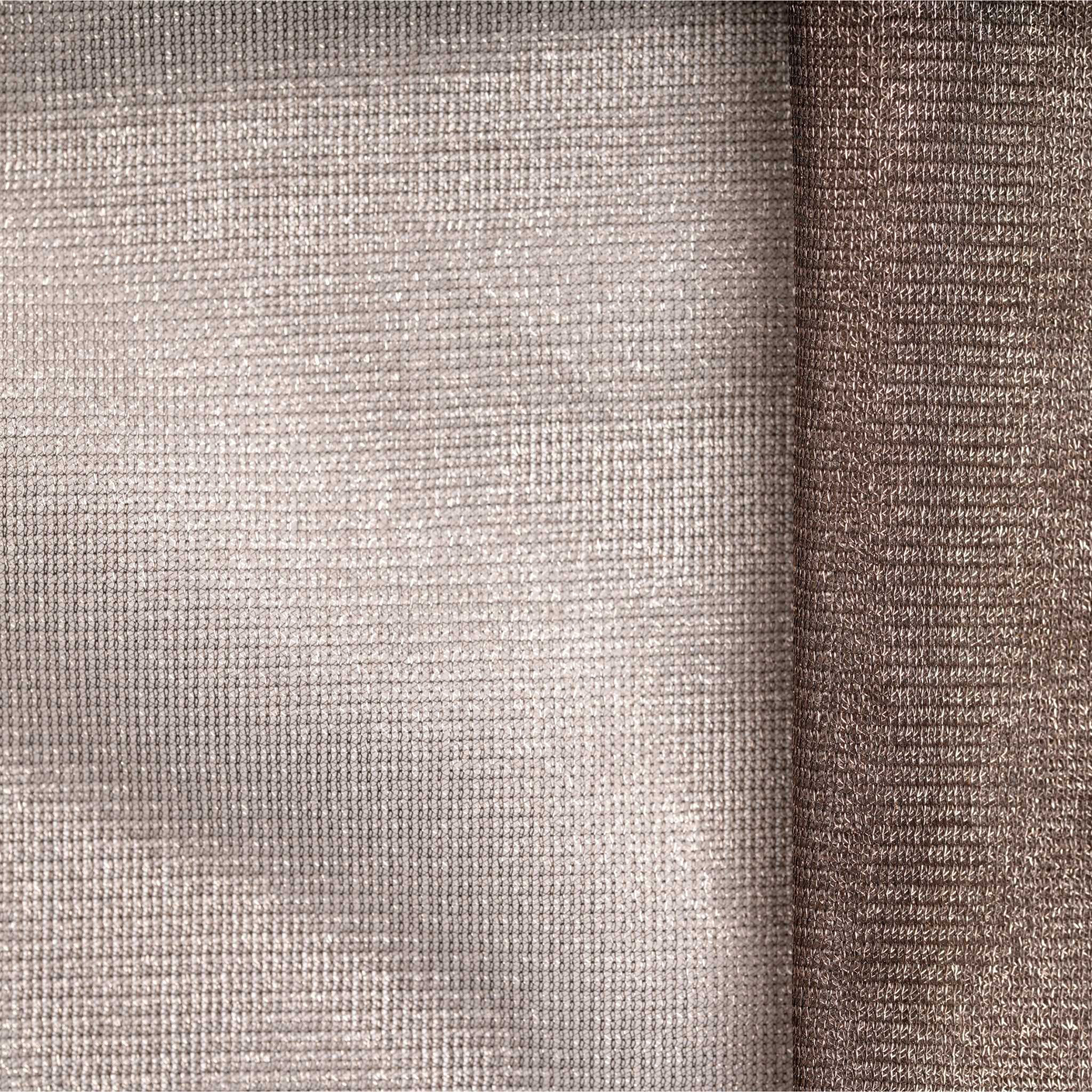 WOREMOR tullx silver nylon fabric shown folded to display flexibility and lightweight quality